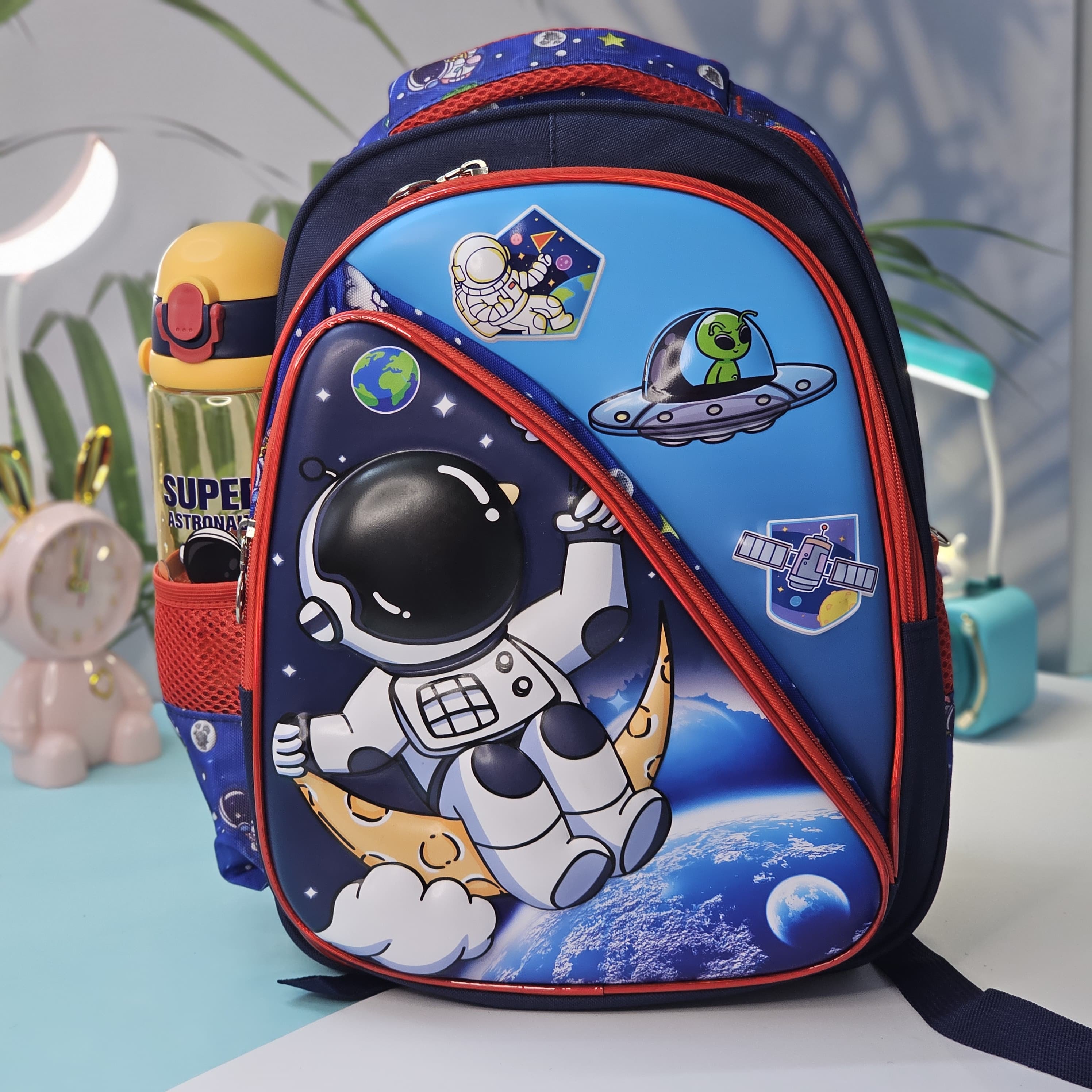 Front view of an Usmile Toys superhero backpack for kids, displaying detailed illustrations of Iron Man and other Avengers characters, suitable for school or travel."www. usmile.toys
